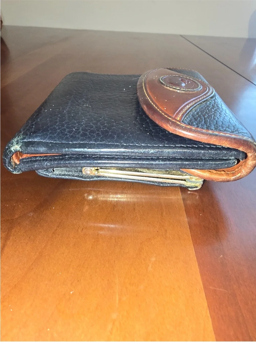 Dooney & Bourke Black and Brown Leather Bi-Fold Wallet vintage.